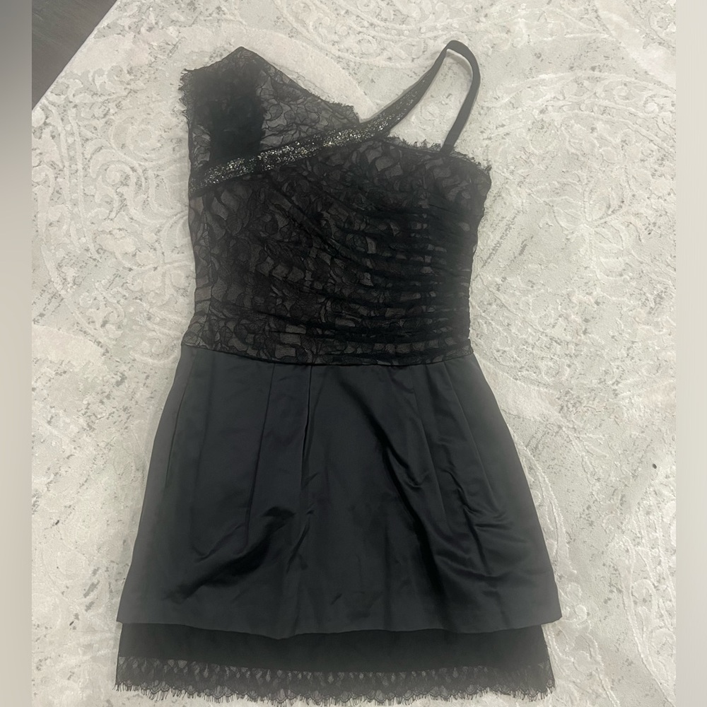Worn once to prom, old dress BCBG Maxazria, kept in good condition. Size 12